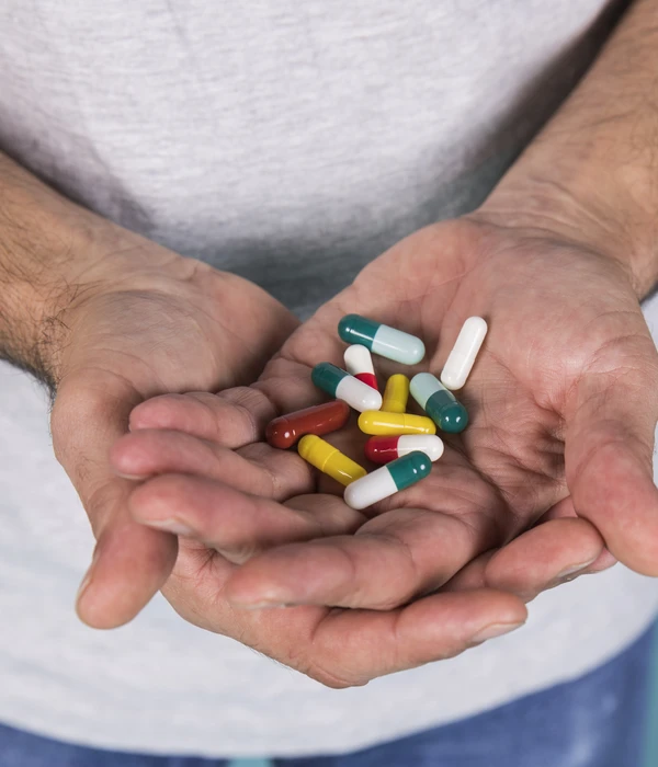man with pills
