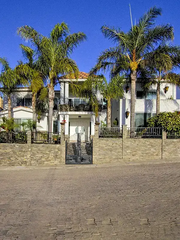 twilight-house-palm-trees-front-page