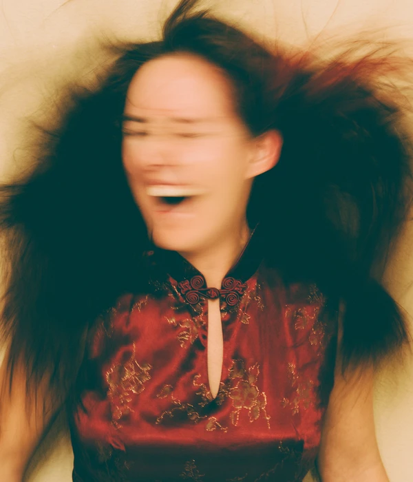 drug-detox-woman-long-hair-smiling-looking-camera-page