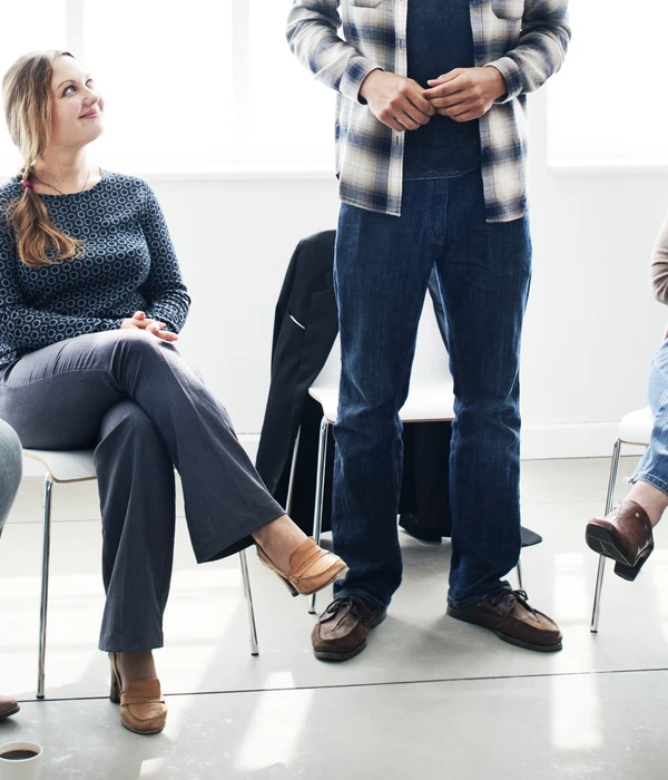 twilight-group-therapy-man-standing-front-people-page