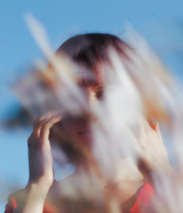 twilight-woman-hair-blowing-wind-page