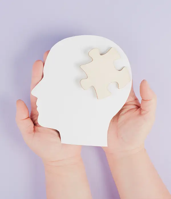 twilight-mental-health-person-holding-puzzle-piece-hands-page